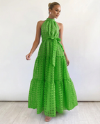 Abito maxi elegante con collo halter e vita legata per donne. 10