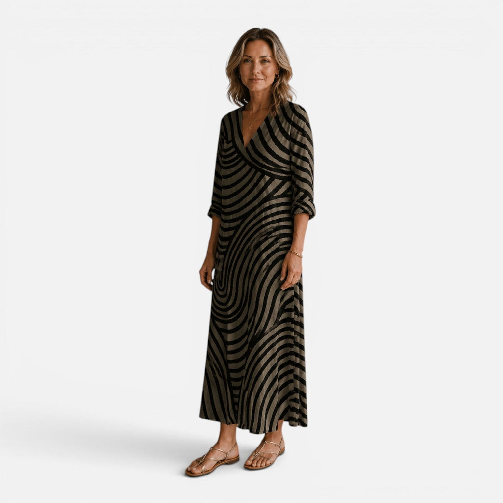 Abito maxi fluido con stampa astratta in beige. 3