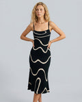 Abito midi a maglia con orlo sirena elegante in nero.