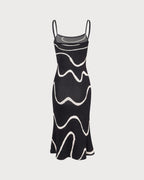Abito midi a maglia con orlo sirena elegante in nero. 3