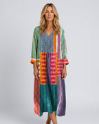 Abito midi geometrico elegante con maniche lunghe e scollatura a V.