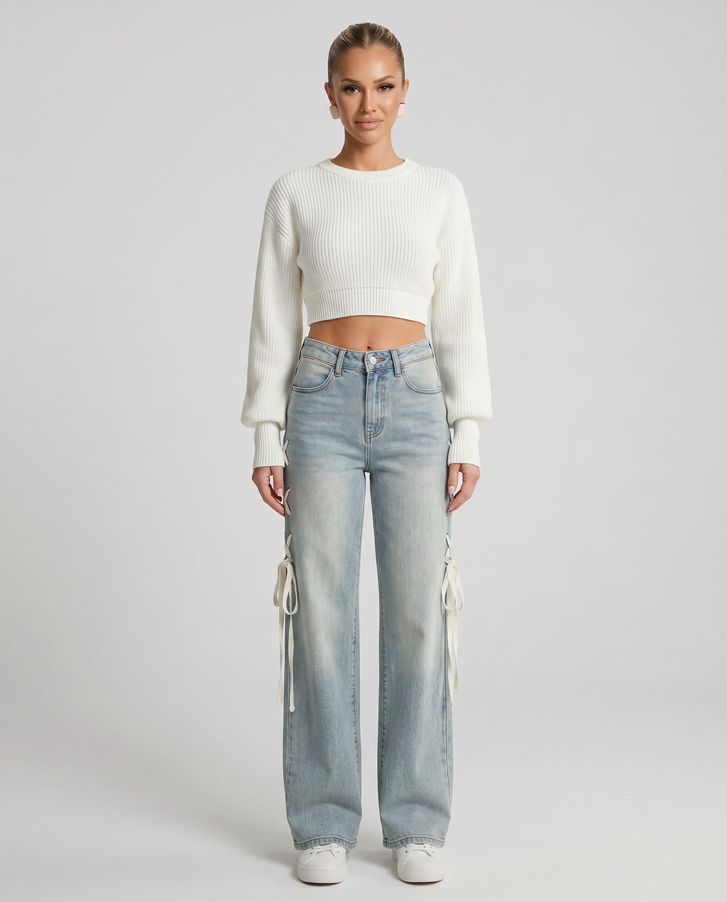 Jeans a gamba larga con lacci laterali in denim azzurro. 4