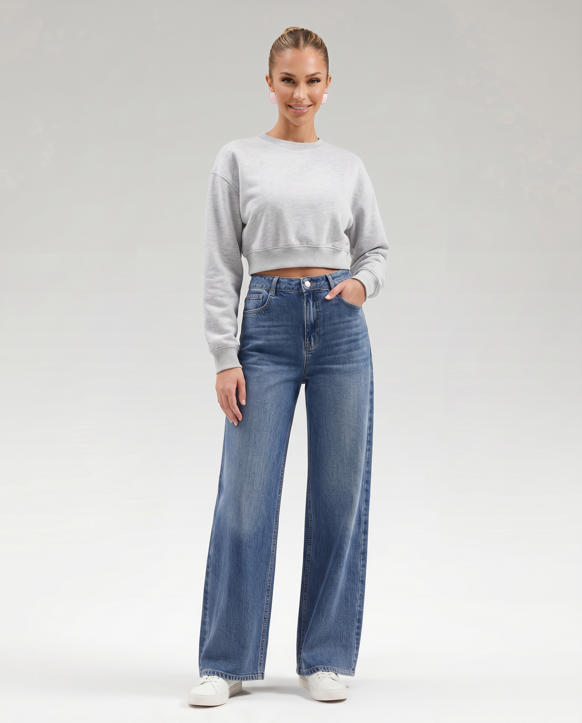 Jeans a gamba larga eleganti in denim blu per donne. 4