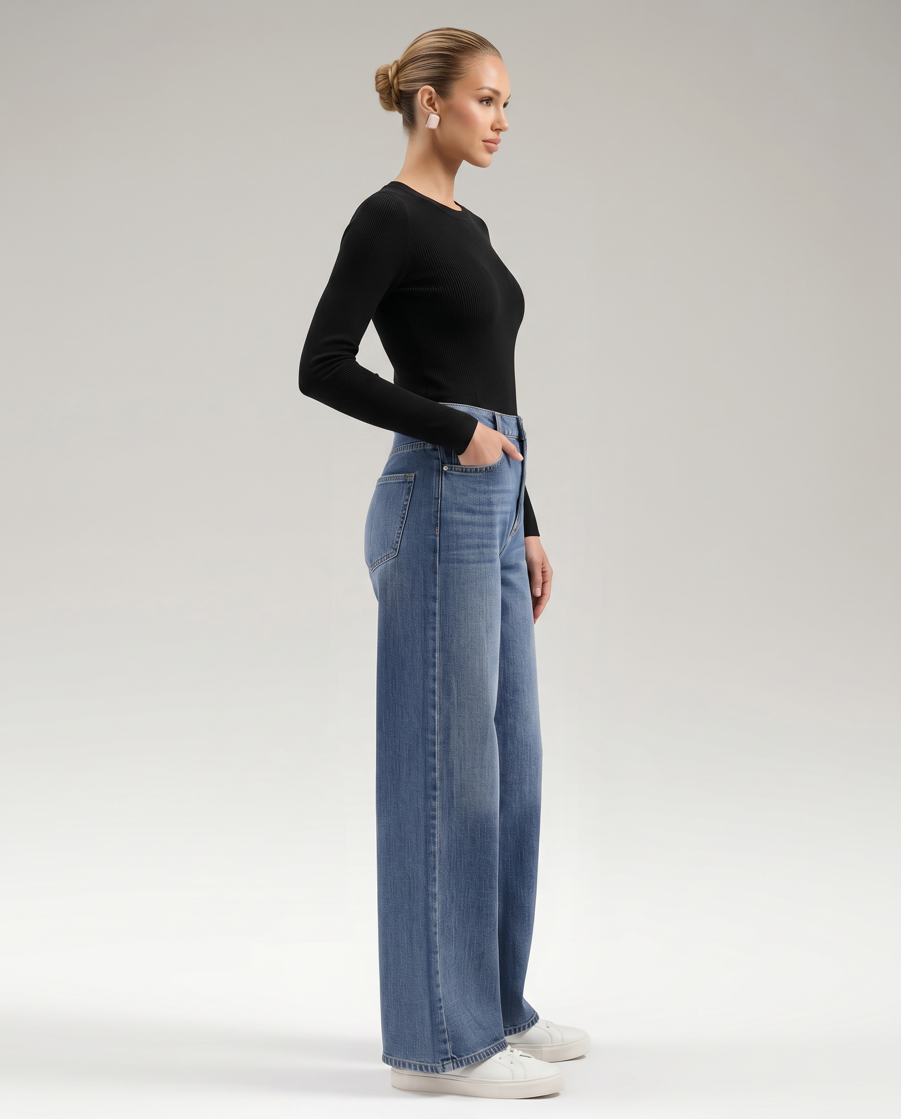 Jeans a gamba larga eleganti in denim blu per donne. 5