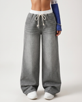 Jeans a gamba larga Diane in denim grigio lavato con vita regolabile.