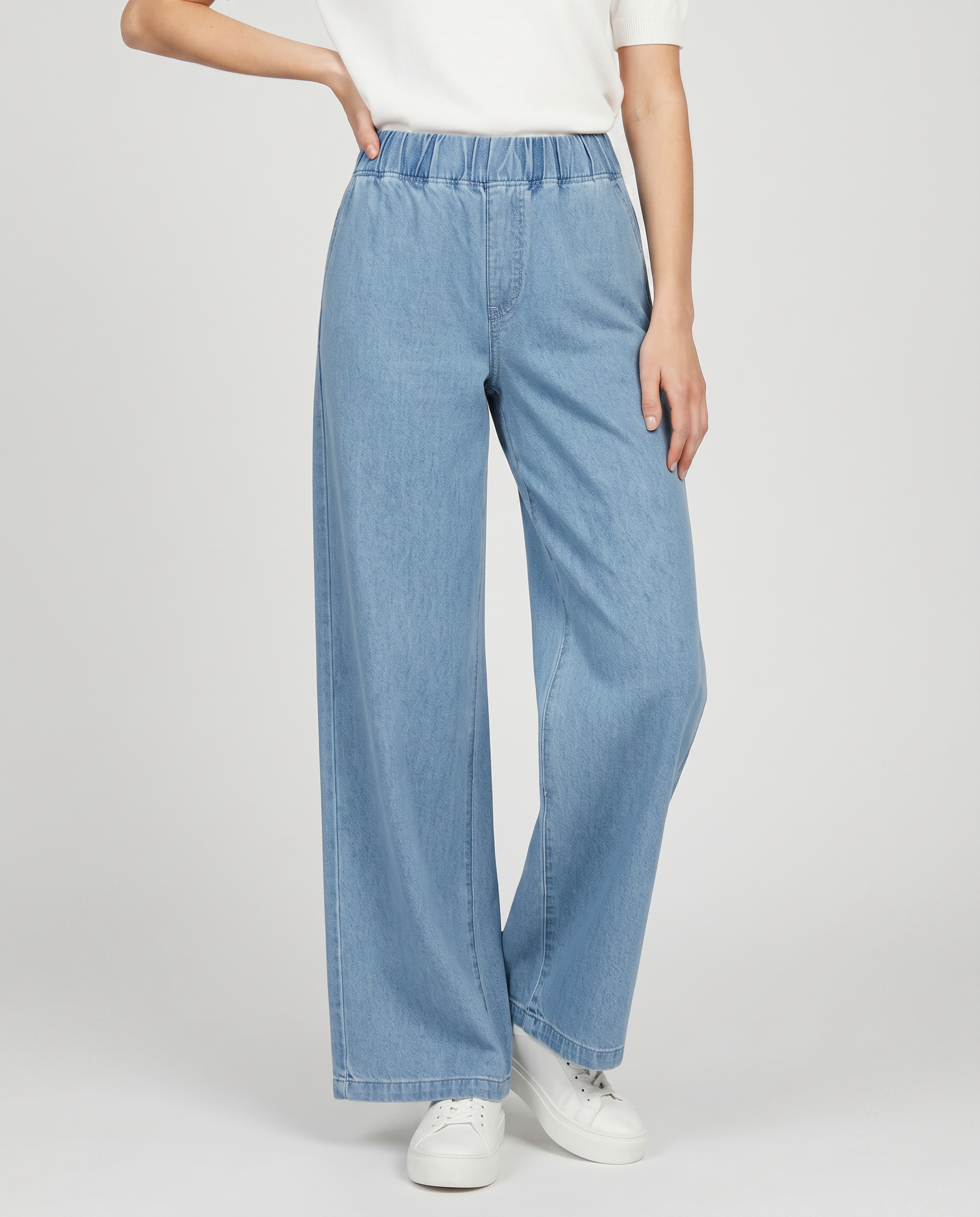 Jeans a gamba larga con vita elastica in denim azzurro