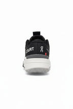 Scarpa da tennis On Running The Roger Pro Fire Unisex in nero e bianco. 3