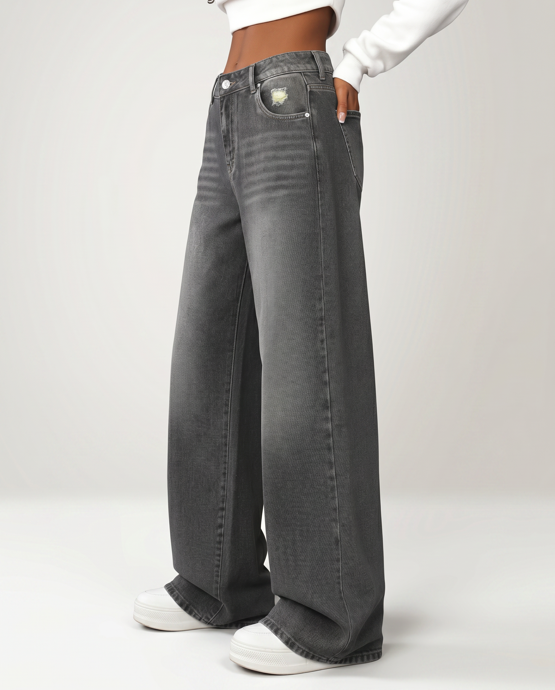 Jeans a gamba larga grigi con dettagli strappati. 3