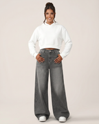 Jeans a gamba larga grigi con dettagli strappati. 6